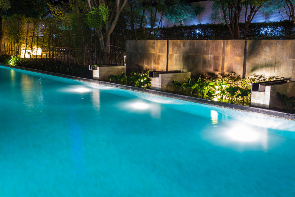 sophisticated outdoor pool lighting in Naples